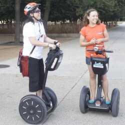 Britney gives instructions to a customer before a tour